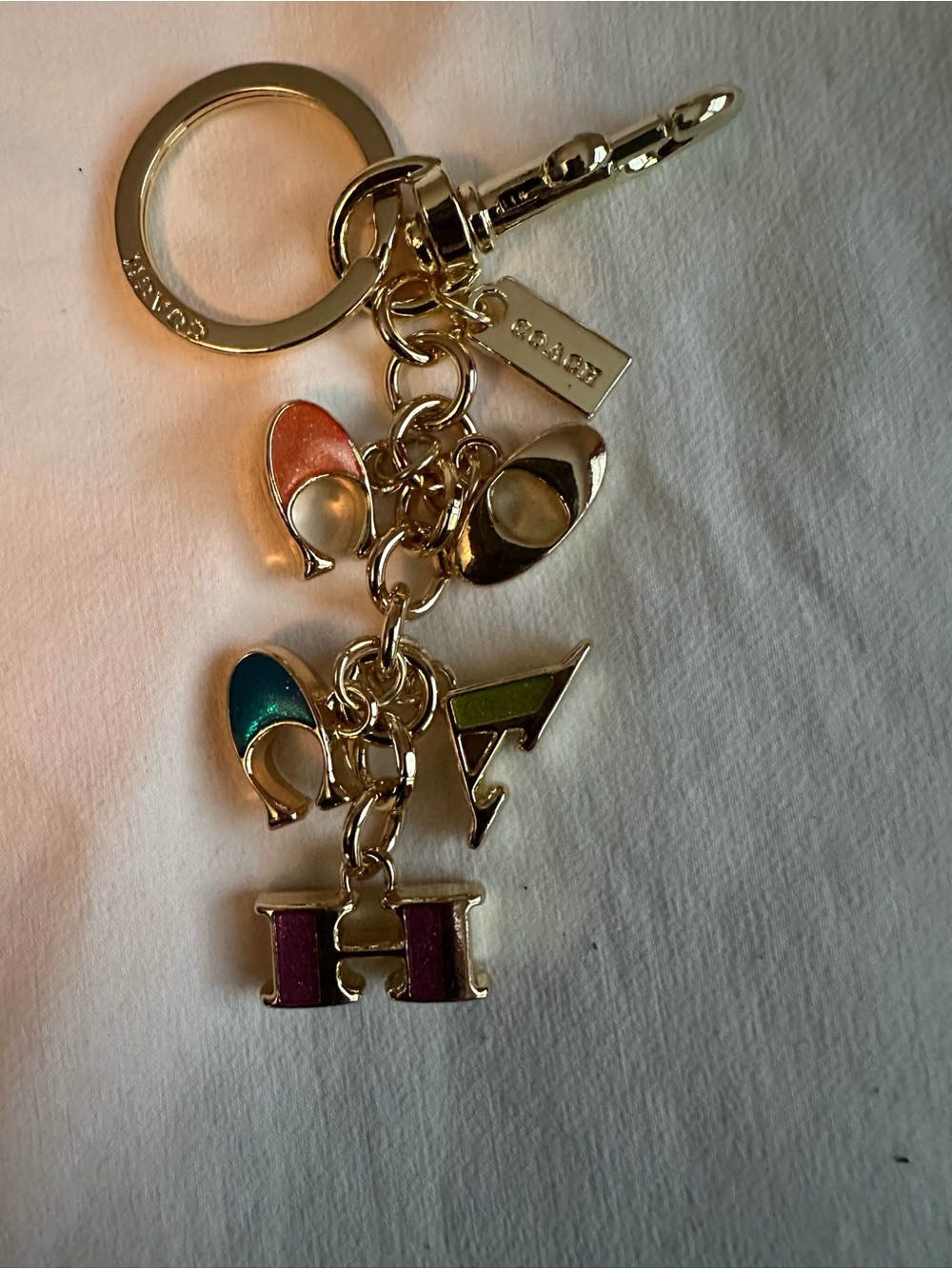 Coach Gold-Tone Enamel Letter & Charm Keychain with Multicolor Accents